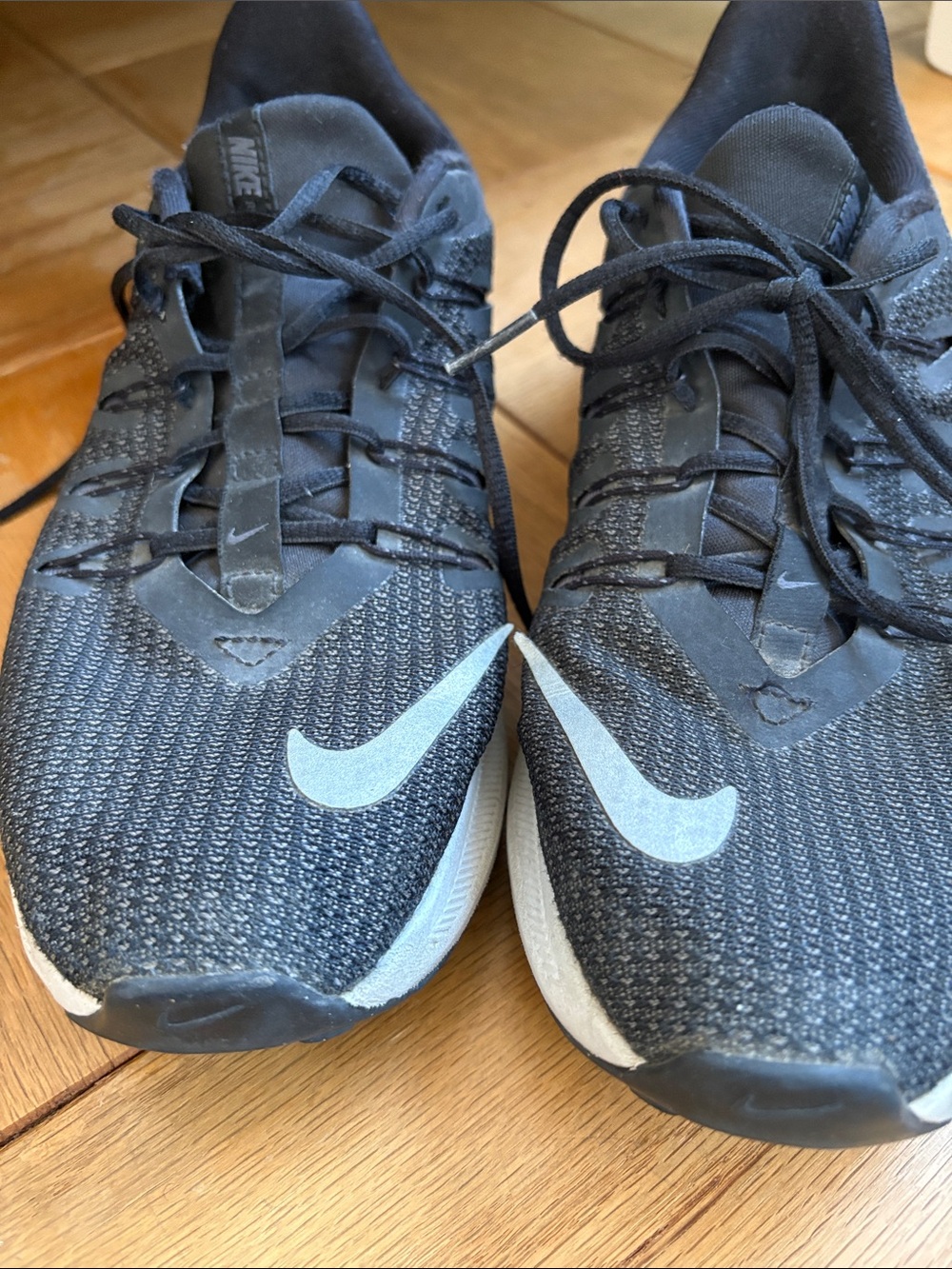 Nike Men’s Black Athletic Shoes with White Swoosh